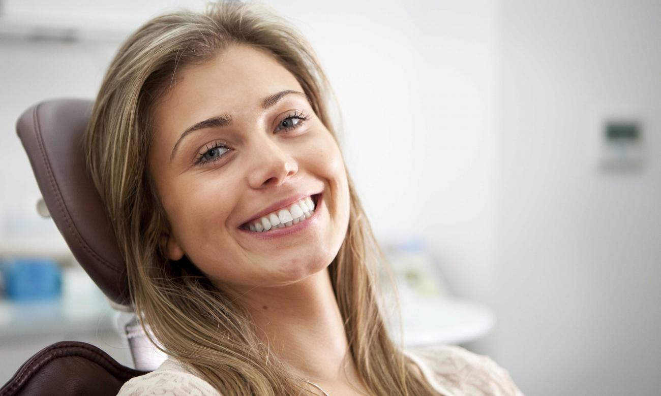 Smiling girl in chair